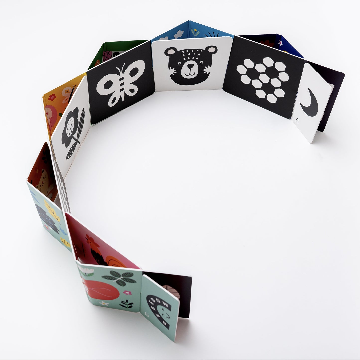 Colorful children's baby arch with animal illustrations on a white background